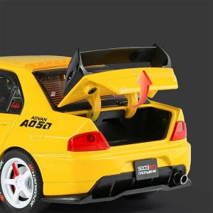 Метална кола Mitsubishi Lancer Evolution 1:24 – жълт тунинг, Без опаковка